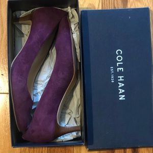 Purple suede Cole Haan pumps.